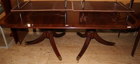 Regency style mahogany twin pillar dining table